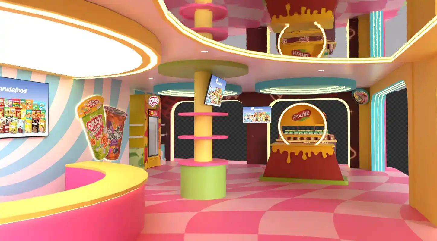 Booth GarudaFood PRJ sisi kanan — branding Okky Maxx, Mountea, Clevo UHT dengan produk 3D oversized di atas fasad